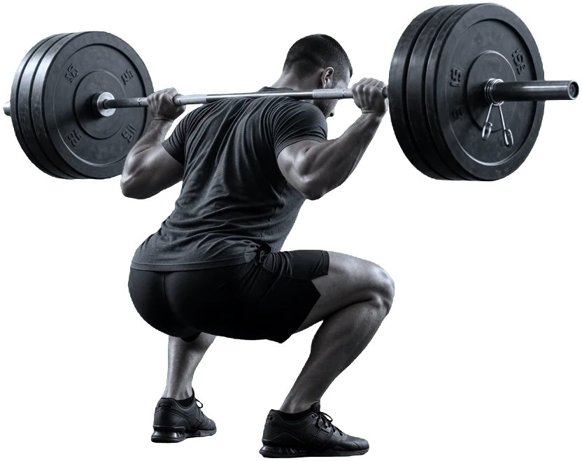 Athlete at the bottom of a heavy barbell back squat under hard rim light